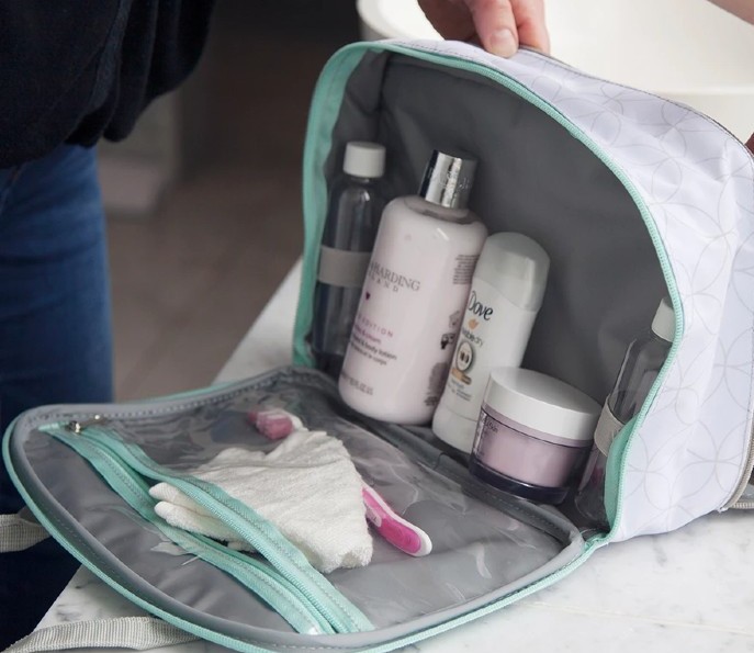 The Cuddledry Baby Wash Bag keeps all your ​toiletries safe and dry!