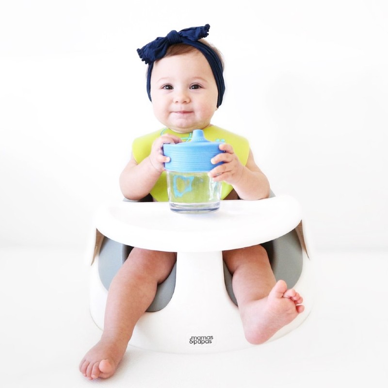 The GoSili top can stretch to accommodate most glasses and cups GoSili Silikids Blue/Lime Universal Silicone Sippy Tops (Pack of 2)