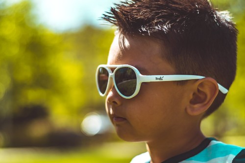 Child wearing Real Shades Sky Sunglasses