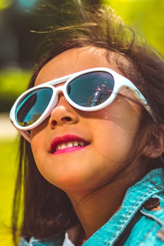 The Sky Glasses feature bendable, flexible frames Child wearing Real Shades Sky Sunglasses