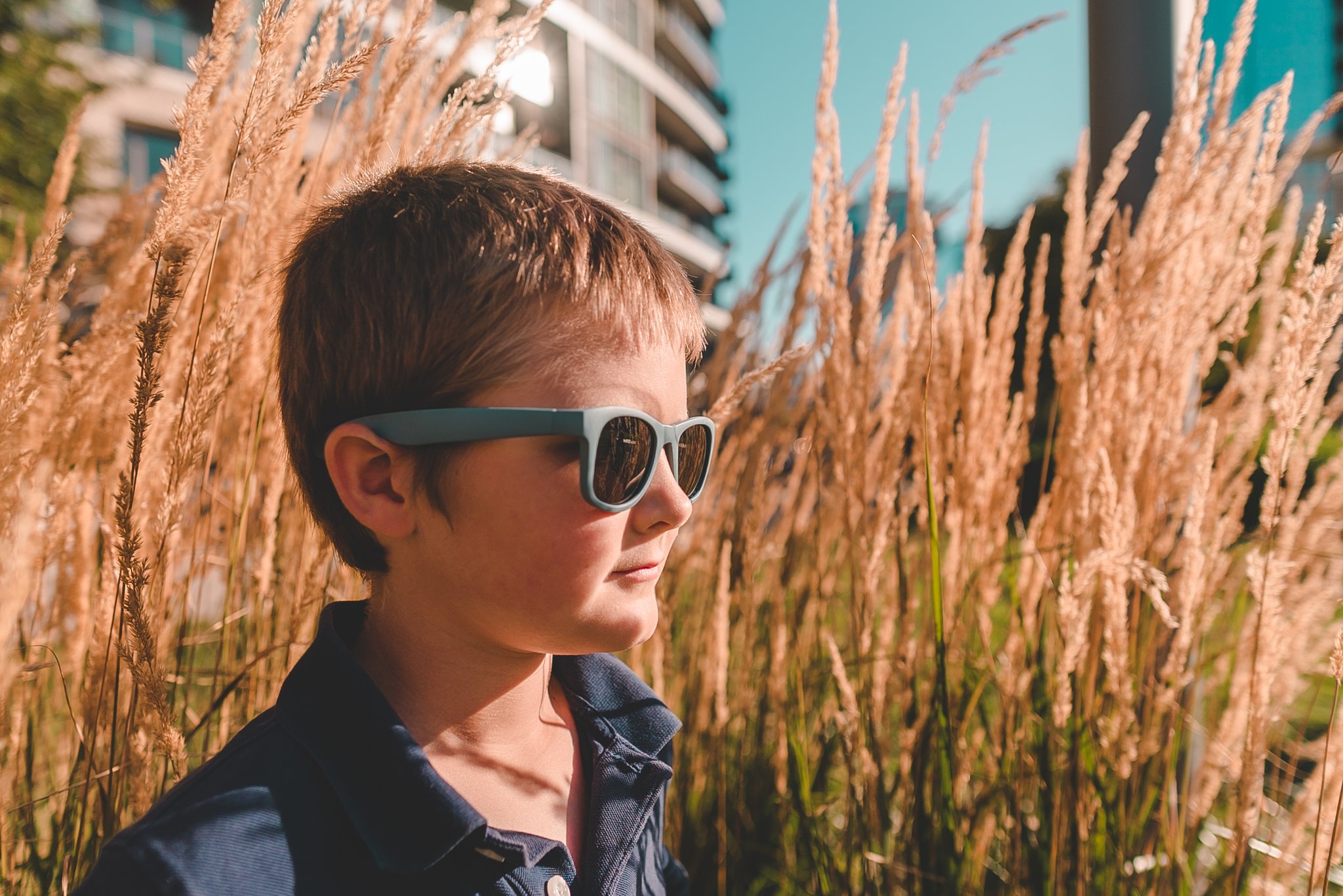 The Surf Sunglasses feature unbreakable frames and shatterproof lenses Child wearing Real Shades Surf Sunglasses