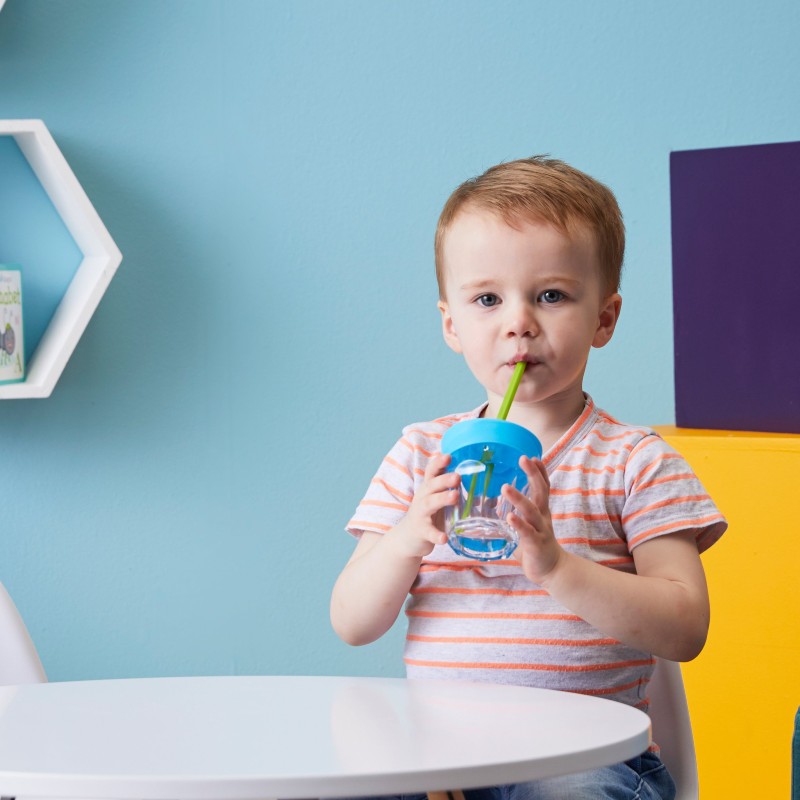 Toddler with the Universal Silicone Lid Set Toddler with the Universal Silicone Lid Set