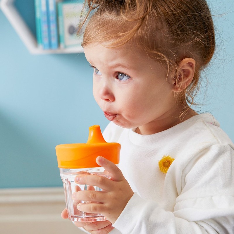 Toddler with the Universal Silicone Lid Set