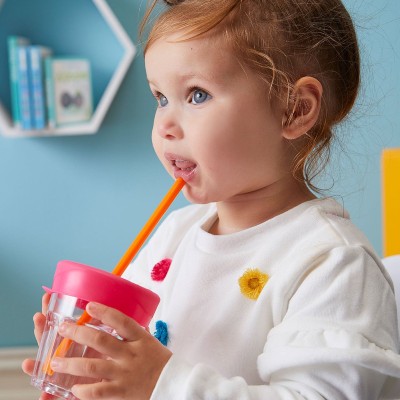 Toddler with the Universal Silicone Lid Set Toddler with the Universal Silicone Lid Set