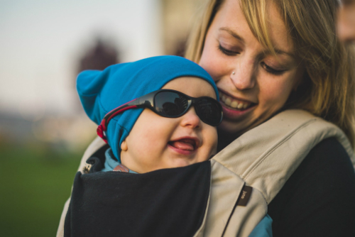 The Explorer Shades feature a strap that provides security to your child Baby Wearing Real Shades Explorer Sunglasses